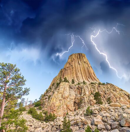 Sunset view of Devil's Tower and surrounding natural landscape, Wyomingの写真素材
