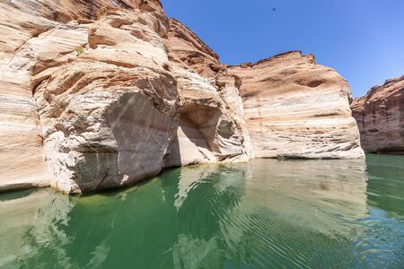 Lake Powell, Arizona. Narrow  cliff-lined canyon from a boat in Glen Canyon National Recreation Area.の写真素材