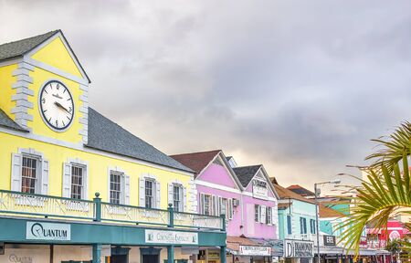 NASSAU, BAHAMAS - FEBRUARY 2012: City streets on a sunny day with tourists.の写真素材