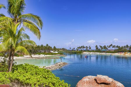 Amazing tropical beach and resort on a beautiful sunny day. Holiday and relax concept.の写真素材