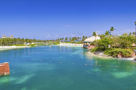 Amazing tropical beach and resort on a beautiful sunny day. Holiday and relax concept.の写真素材