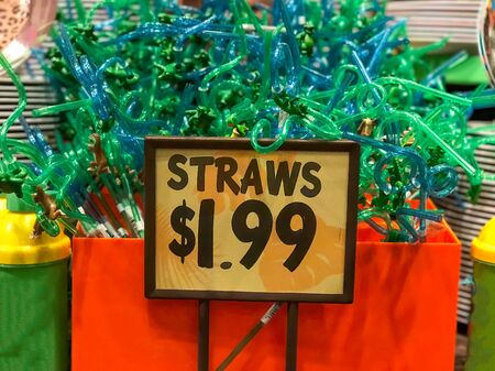 Straws on sale in a shop.の写真素材