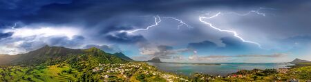 Amazing aerial panoramic view of Mauritius Island with tropical storm approaching, Africa.の写真素材