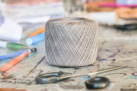 Grey color ball of threads wool in a sewing laboratoryの写真素材