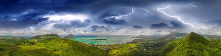 Amazing aerial panoramic view of Mauritius Island with tropical storm approaching, Africa.の写真素材