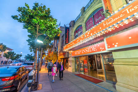 SAN FRANCISCO, CA - AUGUST 7, 2017: The Embarcadero street near Pier 45 at sunset with Madame Tussauds Entrance.のeditorial素材