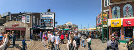 SAN FRANCISCO, CA - AUGUST 7, 2017: Panoramic view of Pier 39 with tourists on a beautiful summer day.のeditorial素材