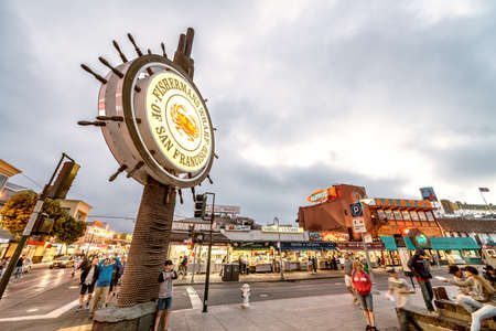 SAN FRANCISCO, CA - AUGUST 7, 2017: Fisherman's Wharf street sign near Pier 45 at night.のeditorial素材