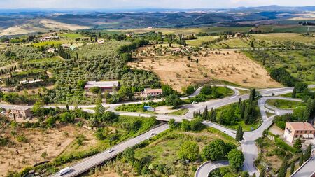 Amazing aerial view of San Quirico medieval town in Tuscany, Italyの写真素材