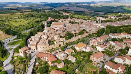 Amazing aerial view of San Quirico medieval town in Tuscany, Italyの写真素材