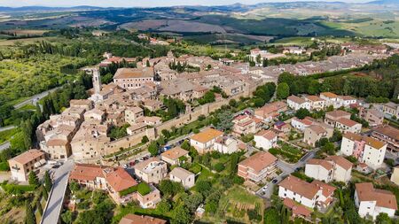 Amazing aerial view of San Quirico medieval town in Tuscany, Italyの写真素材