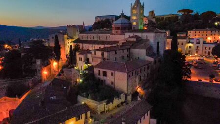 Massa Marittima, Tuscany. Aerial view at night of medieval town.の写真素材