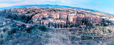 Pienza, Tuscany. Aerial view at sunset of famous medieval town.の写真素材