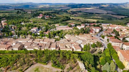 Amazing aerial view of San Quirico medieval town in Tuscany, Italyの写真素材