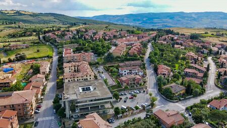 Amazing aerial view of San Quirico medieval town in Tuscany, Italyの写真素材