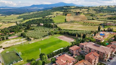 Amazing aerial view of San Quirico medieval town in Tuscany, Italyの写真素材