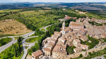 Amazing aerial view of San Quirico medieval town in Tuscany, Italyの写真素材