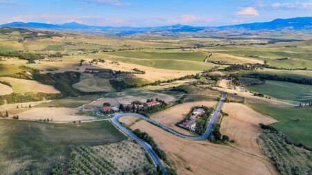Pienza, Tuscany. Aerial view at sunset of famous medieval town.の写真素材