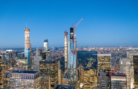 Spectacular aerial view of Manhattan skyline on a beautiful night, New York City, NY, USA.の写真素材