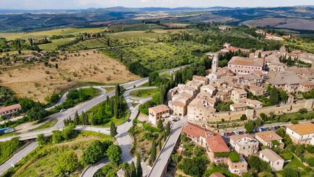 Amazing aerial view of San Quirico medieval town in Tuscany, Italyの写真素材