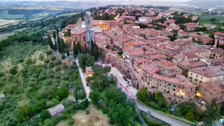 Pienza, Tuscany. Aerial view at sunset of famous medieval town.の写真素材