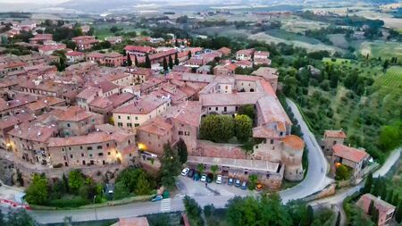 Pienza, Tuscany. Aerial view at sunset of famous medieval town.の写真素材
