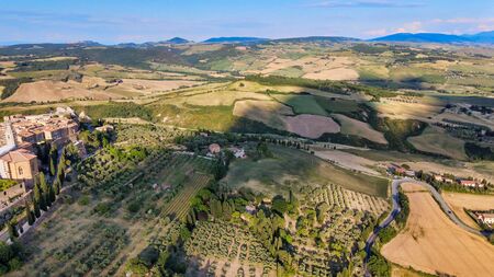 Pienza, Tuscany. Aerial view at sunset of famous medieval town.の写真素材