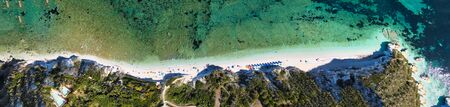 Elba Island, Italy. Amazing downward aerial view from drone of Capo Bianco and Padulella Beach near Portoferraio.の写真素材