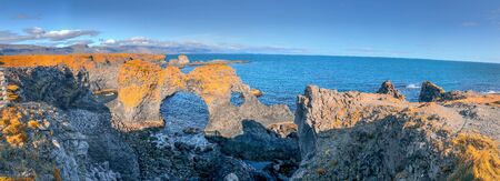 Panoramic view of Arnarstapi coastline, Iceland. Snaefellsnes rocks in summer season.