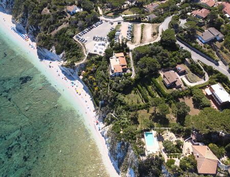 Elba Island, Italy. Amazing downward aerial view from drone of Capo Bianco Beach near Portoferraio.の写真素材
