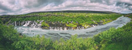 Hraunfossar Waterfalls and River in the Western Part of Iceland, Europe in summer season.の写真素材