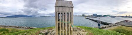Beautiful coastline of Reykjavik in summer from Thufa Hill, Iceland. Panoramic view.の写真素材