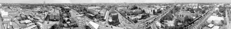 MAEKLONG, THAILAND - DECEMBER 15, 2019: Panoramic aerial view of famous railway market and city skyline.のeditorial素材