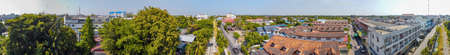 MAEKLONG, THAILAND - DECEMBER 15, 2019: Panoramic aerial view of famous railway market and city...