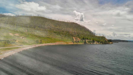 Hills in front of Yellowstone Lake, Wyoming, USA. Aerial viewの写真素材