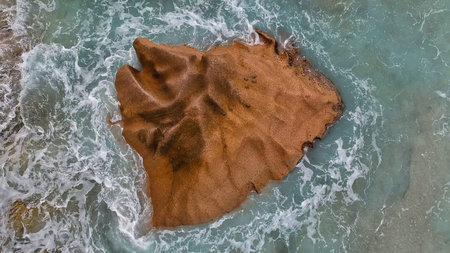 Amazing aerial view of Twelve Apostles cliffs on a coudy afternoon, Australia