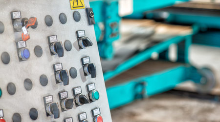 Warehouse of metal coils. Industrial production and logistics concept. Roll of steel sheet in a...