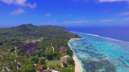 Amazing La Digue Beach on a beautiful day, Seychelles aerial view from drone.の写真素材