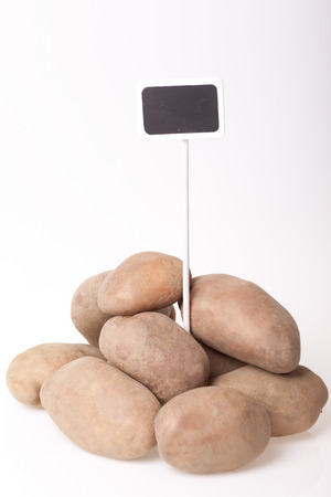 Fresh potatoes on the table for advertisingの写真素材