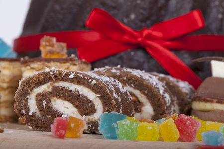 Very tasty chocolate cake on a wooden baseの写真素材