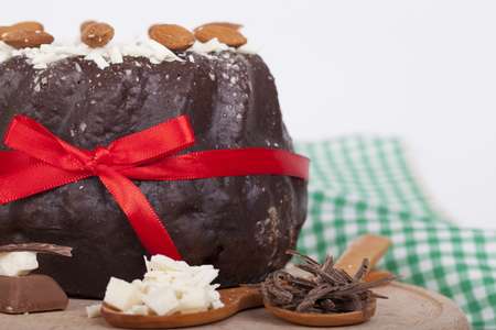 Very tasty chocolate cake on a wooden baseの写真素材