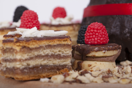 Very tasty chocolate cake on a wooden baseの写真素材
