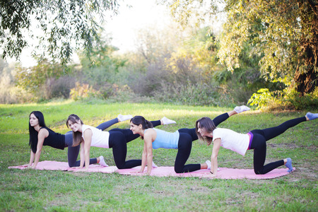Girl exercise in nature, Selective focus and small depth of field, lens flareの写真素材