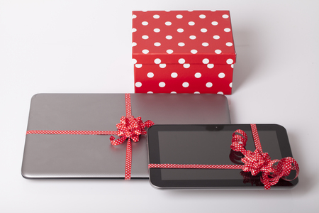 The new mobile phone on the table as a giftの写真素材