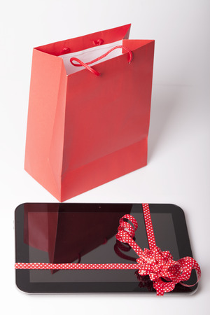 The new mobile phone on the table as a giftの写真素材
