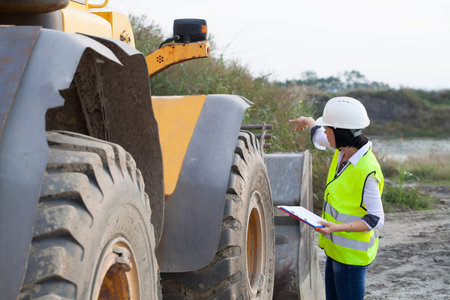 Woman engineer on a construction site, Selective focus and small depth of field