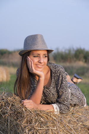The beautiful girl in the countryside, Selective focus and small depth of field, lens flareの写真素材