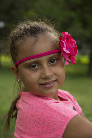 Girl playing in the park, Selective focus and small depth of fieldの写真素材