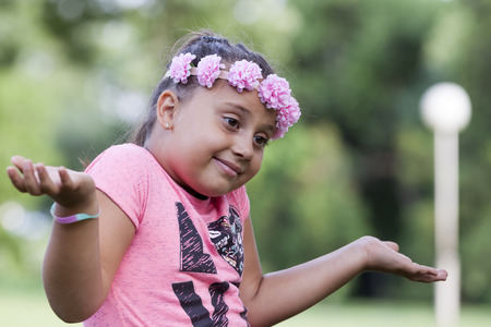 Girl playing in the park, Selective focus and small depth of fieldの写真素材