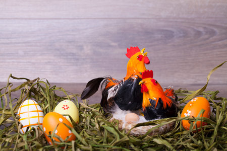 Easter decoration with eggs on a wooden backgroundの写真素材